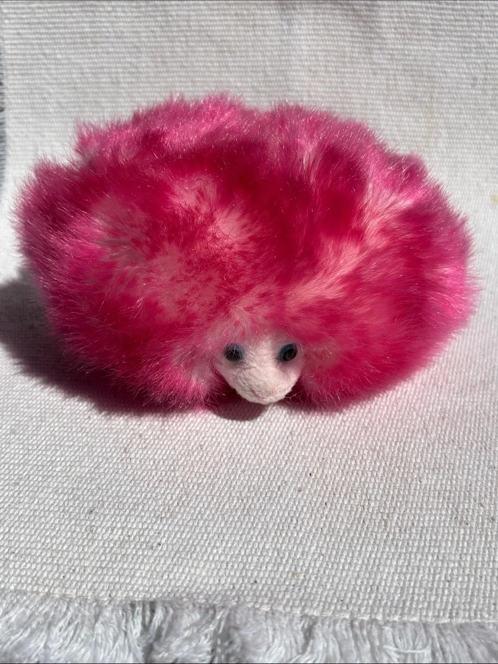 Universal Studios Wizarding World Harry Potter Pink Pygmy Puff plush toy.